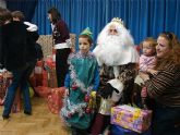Un centenar de niños y niñas del Centro de Atención Temprana de Lorca reciben regalos de manos de los Reyes Magos de Oriente
