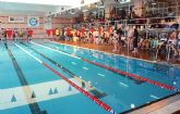 Los deportistas nadadores del centro ocupacional “José Moya” participan en el Campeonato Regional de Natación, celebrado en Lorca