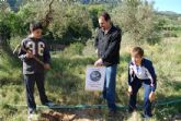 60 niños y niñas comienzan el programa árbol plantando 200 árboles junto al río mula