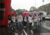 Decenas de personas participan en la marcha 'Unidos por un corazón sano' a pesar de la lluvia