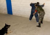 La Unidad Canina de Policía Naval hace prácticas en el Cartagonova