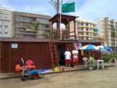 Socorristas Acuáticos de Cruz Roja adscritos al Plan COPLA 2011 del Ayuntamiento de Águilas rescatan a una mujer en la Playa de La Colonia