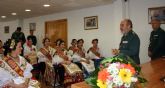 La Reina de la Huerta y sus damas de honor visitan las instalaciones de la Guardia Civil de Murcia.