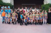 Niños y niñas del Club de Patín Totana realizan una exhibición de patinaje artístico en el parque municipal 