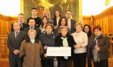 Las Cáritas de Caravaca reciben 5.250 euros de la obra social de la caixa