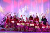 Papá Noel es recibido por cientos de niños en Águilas