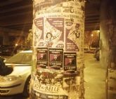 Inicio de la pegada de carteles con motivo de la convocatoria de huelga feminista para el 8 y 9 de marzo en la Región de Murcia