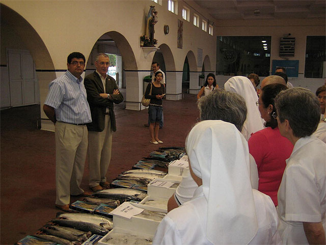 Atención Social participa con la Cofradía de Pescadores en la entrega de lotes de pescado a las instituciones benéficas de Cartagena - 1, Foto 1