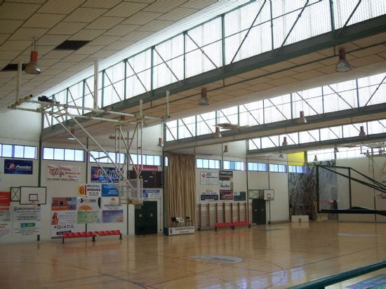 Comienzan las obras de reparación de la cubierta del pavimento de madera del Pabellón Municipal de Deportes “Manolo Ibáñez” - 1, Foto 1