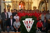 La plantilla del Olmpico de Totana realiza la tradicional ofrenda floral a Santa Eulalia