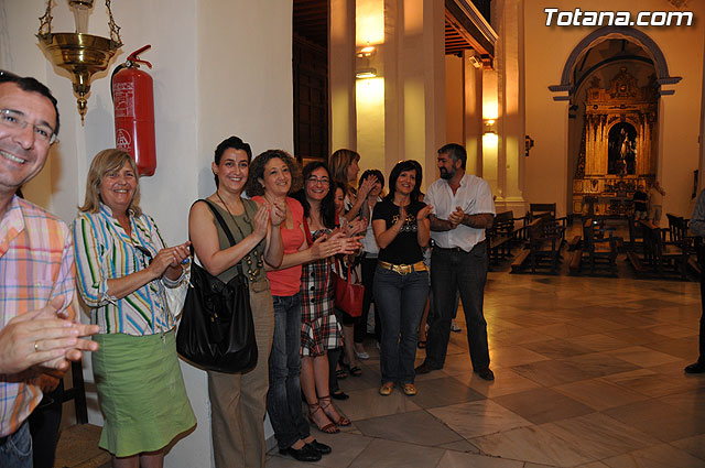 Autoridades municipales y trabajadores del Ayuntamiento realizan una ofrenda floral a su patrona Santa Rita en la iglesia parroquial de Santiago - 16