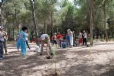 Más de 80 personas con discapacidad psíquica y 25 voluntarios participan en una plantación de árboles en El Valle y Carrascoy