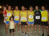 Pedro Ruiz y Rosa María Hernández, del Club Atletismo Totana, subieron al podium en la XVI carrera nocturna de Mazarrón