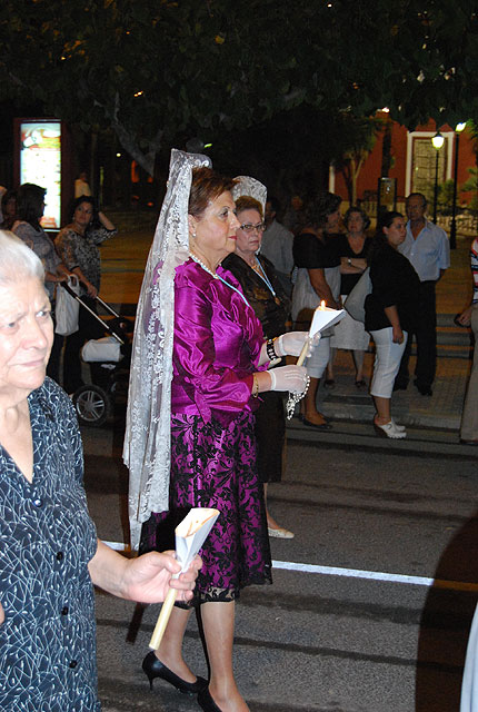 La imagen de Nuestra Señora del Rosario procesionó por las calles de la localidad, Foto 4