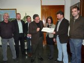 La Asociacin de Msicos de Molina de Segura entrega a Cruz Roja Española 4.700 euros, recaudados en el Festival Solidario Pro Hait