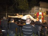 Vía crucis penitencial organizado por la Hermandad de Jesús en el Calvario y Santa Cena