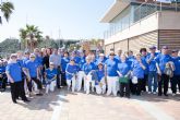 Los mayores practican taichi en el puerto deportivo de Mazarrón