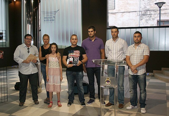 Las fotografías del concurso de los Caballos del Vino se exponen en la plaza de Abastos - 1, Foto 1