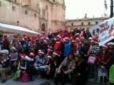 Alumnos del colegio Villaespesa felicitan la Navidad con villancicos en la Plaza de España