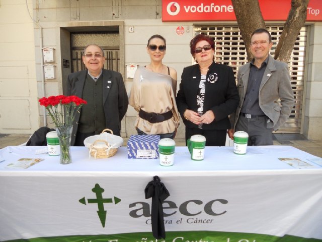 The Local Board of the AECC Totana euros in 2883 collected alms on Palm Sunday last, Foto 1