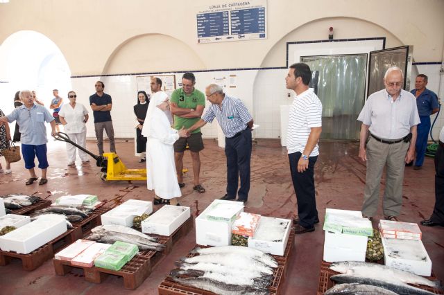 Las organizaciones benéficas de la ciudad reciben 300 kilos de pescado por el Día del Carmen - 1, Foto 1