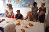 Los usuarios del Centro de Día del Servicio de Estancias Diurnas de Alzheimer celebran un almuerzo totanero