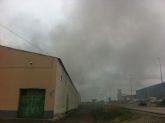 Protección Civil y Policía Local intervienen en un incendio que tiene lugar en un secadero de pimiento para pimentón de Totana