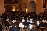 La Escuela de Música ofrece su concierto de Navidad en la iglesia de San Lázaro, completamente abarrotada de espectadores