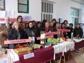 Las asociaciones de mujeres exponen sus trabajos en el Mercado Central