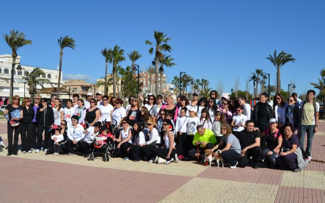 Cerca de 200 personas participan en la marcha Muévete por ti, muévete por ella a beneficio de la AECC - 1, Foto 1