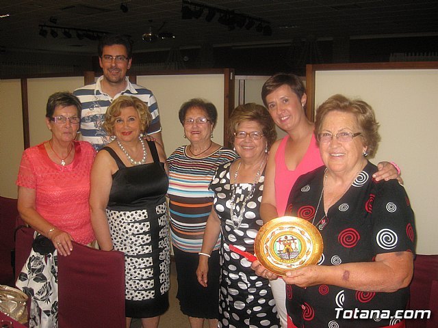 The association of housewives, consumers and users of the "Three Hail Marys" finish the course, Foto 1