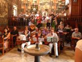 El Taller de Guitarra, Lad y Bandurria despide el curso cantando una misa en La Santa