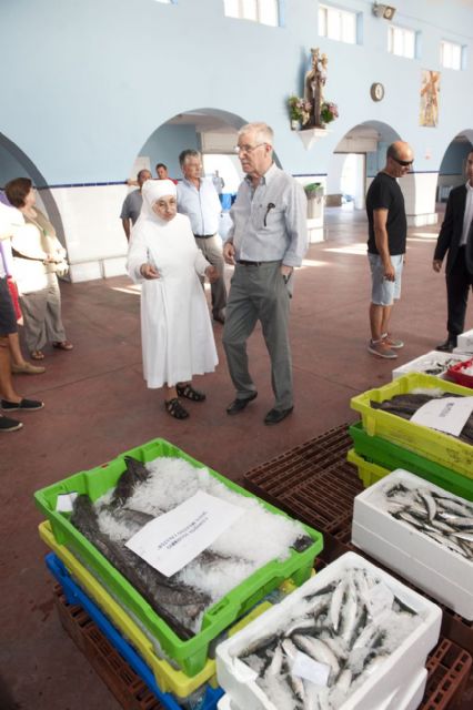 La Cofradía de Pescadores muestra su faceta más solidaria en el Día del Carmen - 1, Foto 1