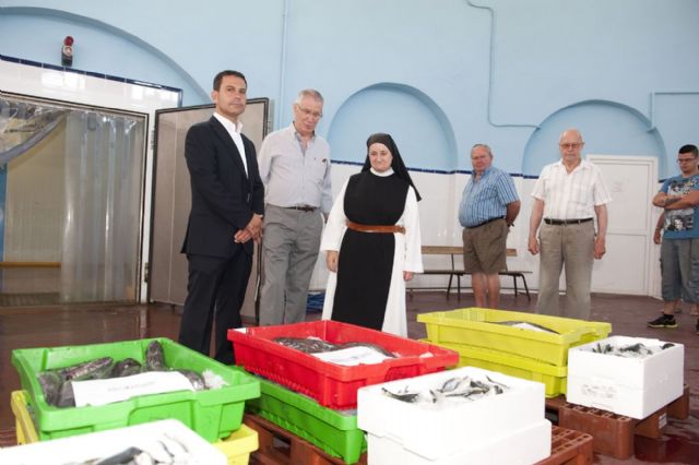 La Cofradía de Pescadores muestra su faceta más solidaria en el Día del Carmen - 5, Foto 5