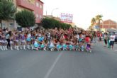 Las peñas dan brillo al multitudinario desfile de carrozas de Las Torres de Cotillas
