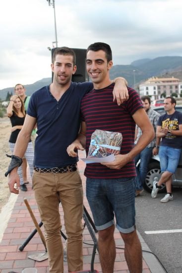 Una veintena de personas participan el concurso de “Lanzamiento de azada”, Foto 3