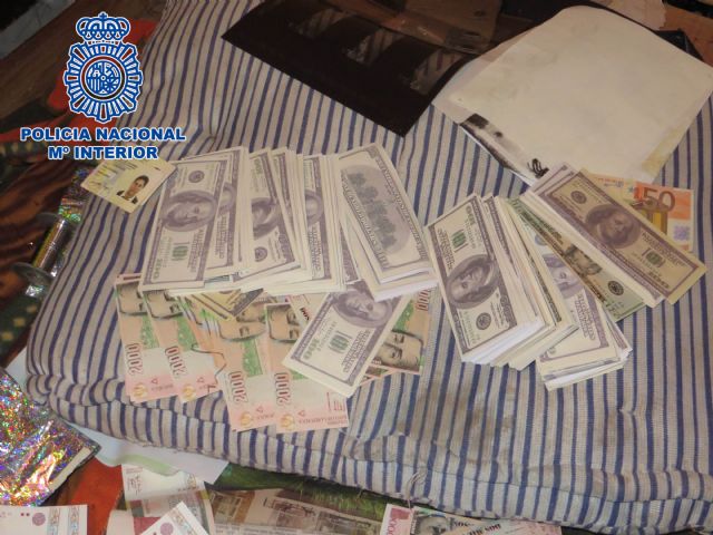 Desmantelado en Colombia un laboratorio de falsificación de euros, dólares USA y pesos colombianos - 1, Foto 1