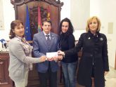 Los vecinos de la pedana lorquina de Doña Ins donan a la Mesa Solidaria de Lorca 1.000€ de la subvencin municipal de sus fiestas que cancelaron en 2011 por los sesmos