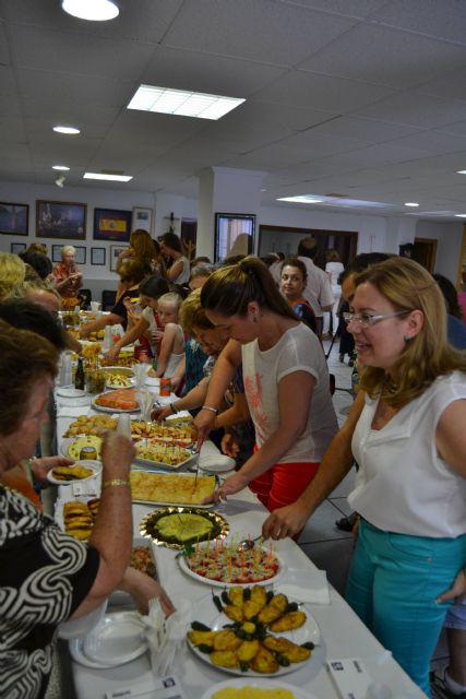 Las Amas de Casa comparten platos caseros en el encuentro gastronómico de las Fiestas Patronales - 1, Foto 1