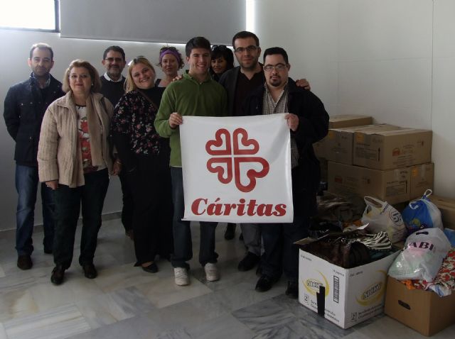 Las personas con discapacidad intelectual y sus familias donan alimentos, ropa y juguetes por medio de las asociaciones de FEAPS Región de Murcia - 1, Foto 1