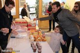 El II desayuno solidario a beneficio de Critas recaud unos 200 Kg de comida y ms de 100 juguetes