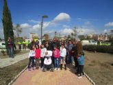 La iniciativa Jardinería Ocupa llega a El Castellar de Churra con la plantación de 36 árboles frutales