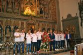 ElPozo Murcia FS realiza la ofrenda floral a la Virgen de la Fuensanta antes de iniciar la Liga