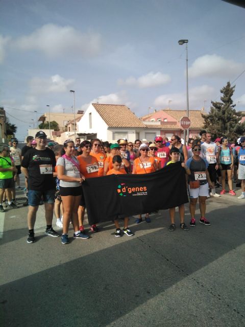 Más de un centenar de personas toman parte en la I Marcha Solidaria en el barrio cartagenero de Los Dolores, a beneficio de D´Genes - 1, Foto 1