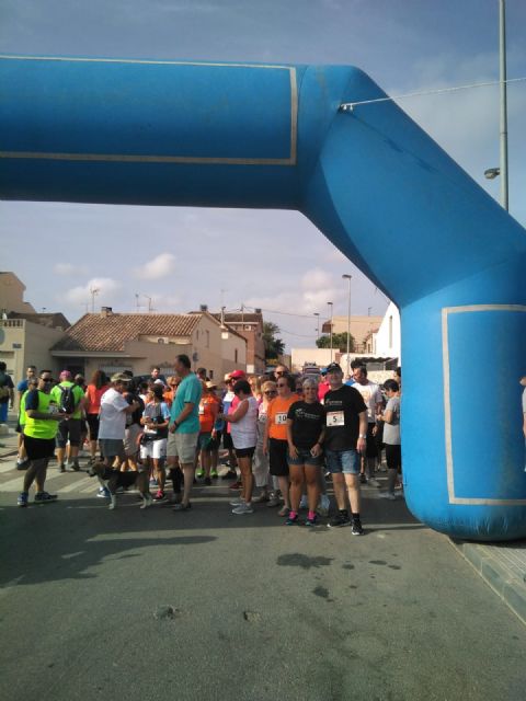 Más de un centenar de personas toman parte en la I Marcha Solidaria en el barrio cartagenero de Los Dolores, a beneficio de D´Genes - 3, Foto 3