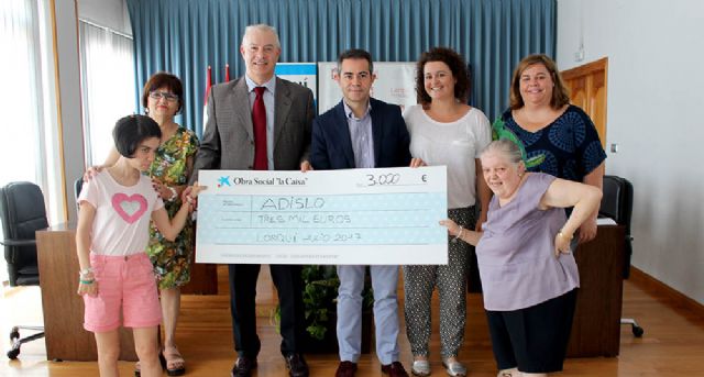 ADISLO recibe 3.000€ de la Obra Social de La Caixa - 1, Foto 1