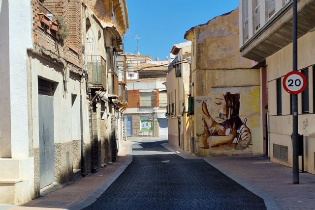 El Ayuntamiento de Lorca finaliza los trabajos de acondicionamiento con asfalto impreso de la calzada de la calle Carril de Caldereros - 1, Foto 1