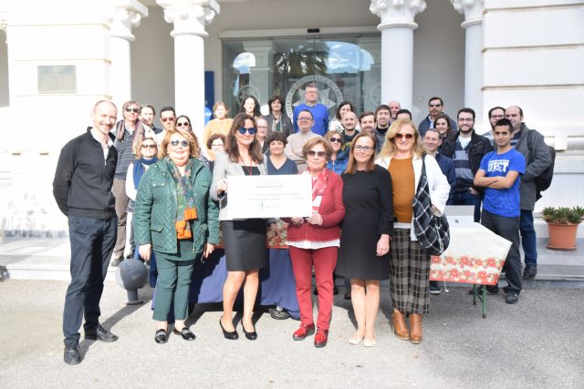 Los empleados de la UPCT entregan a ASIDO el cheque solidario de 2019 - 1, Foto 1