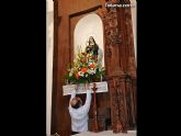 Autoridades municipales y trabajadores del Ayuntamiento realizan una ofrenda floral a su patrona Santa Rita en la iglesia parroquial de Santiago - 14