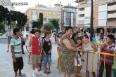 Numerosos niños y niñas se divierten con las actividades infantiles e hinchables en la plaza de la Balsa Vieja - 5